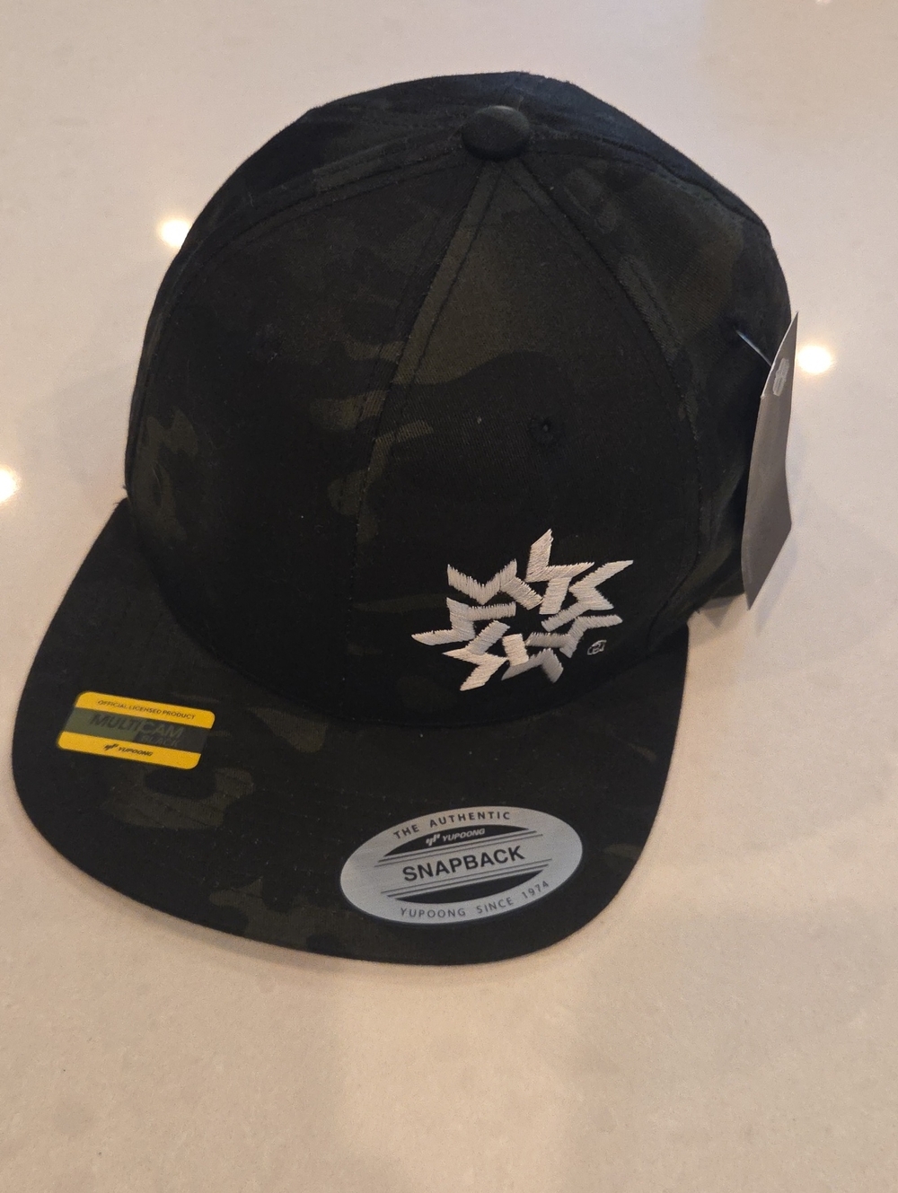 Black Camouflage Snapback Hat with White Star Emblem